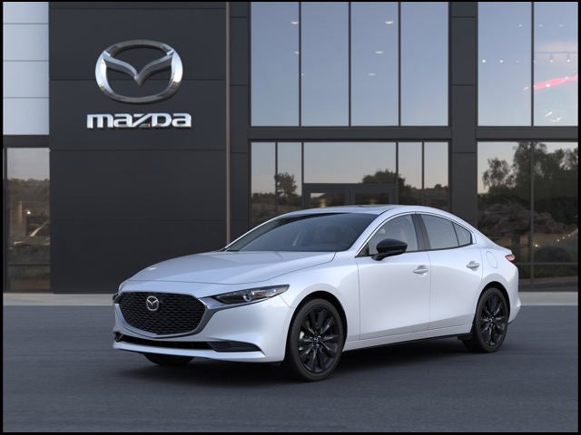 2026 Mazda Mazda3 Sedan 2.5 S Carbon Edition AWD in Snowflake White Pearl — front three-quarter view